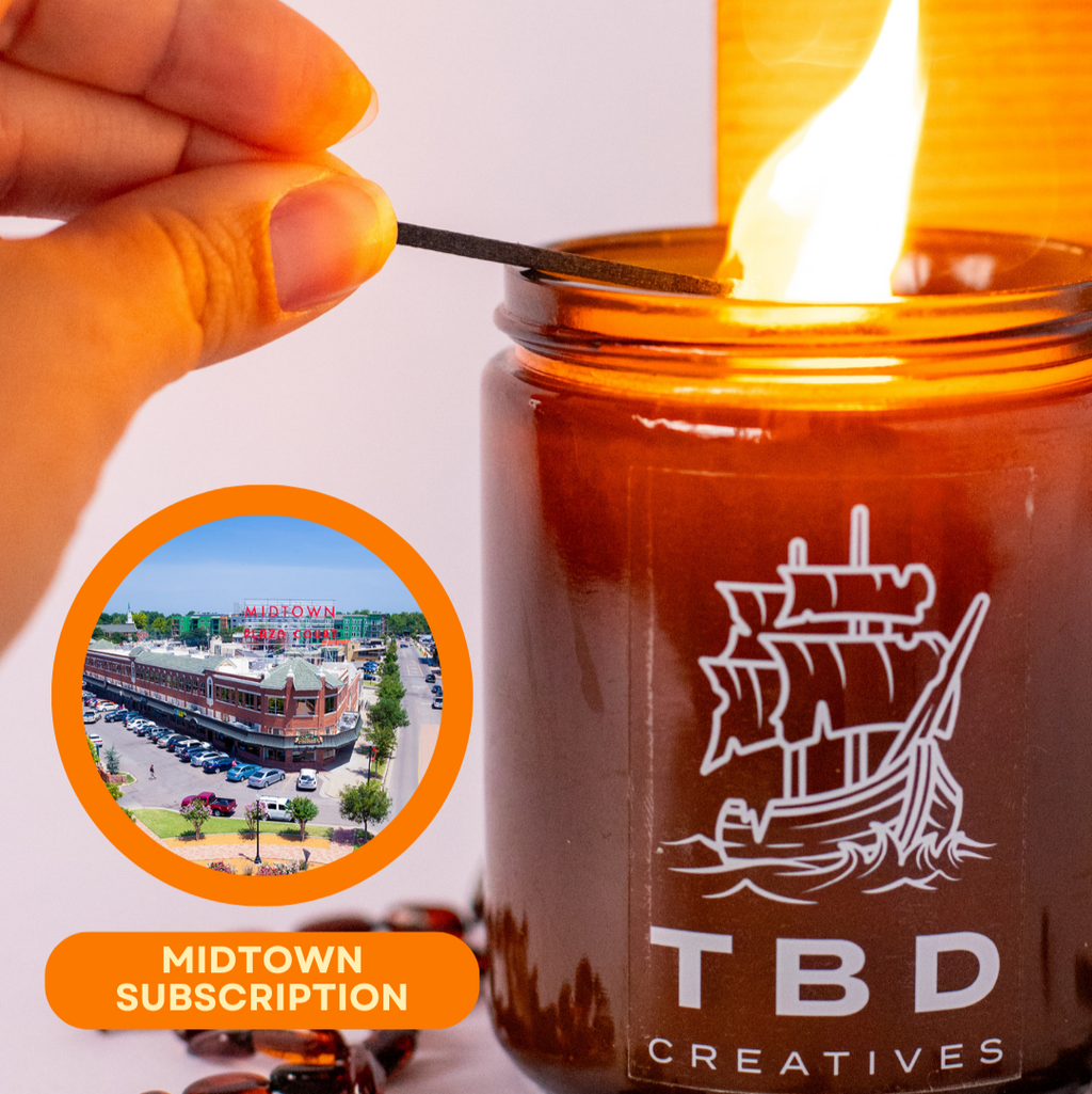 Candle being lit from a match, with 'TBD Creatives' branding and a small inset image of a building.